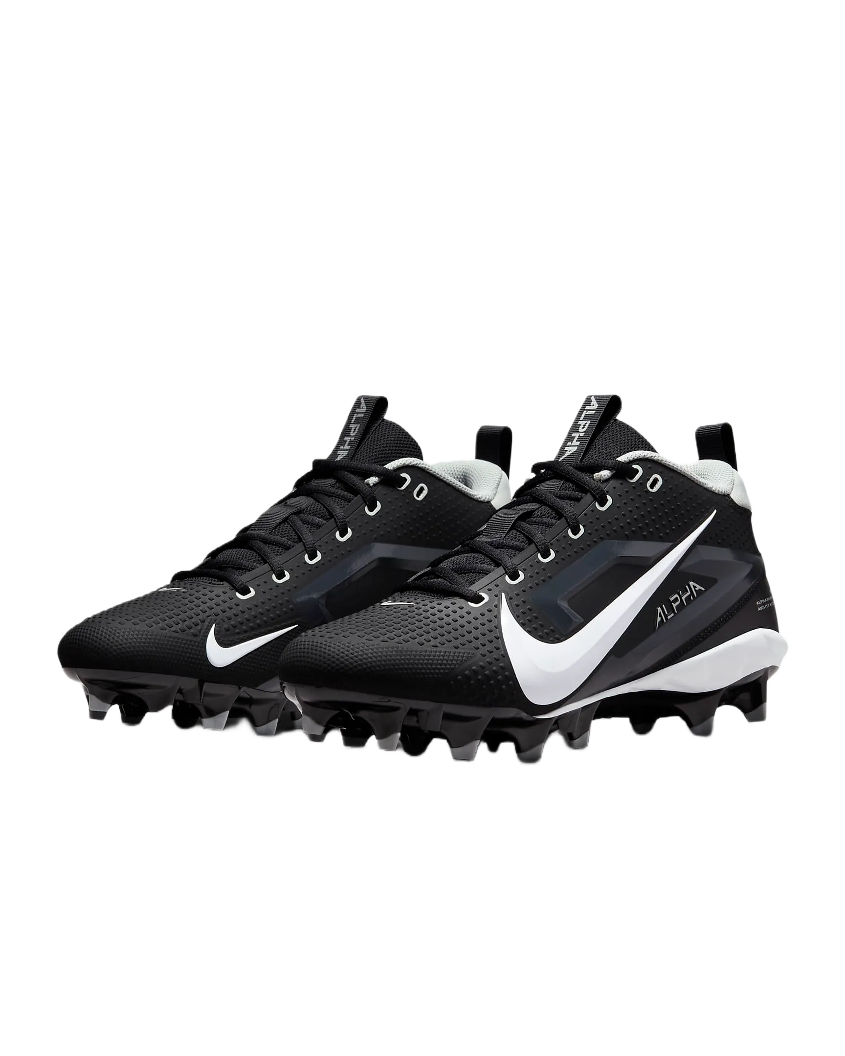 Nike Alpha Menace Varsity 4 black football cleats with white swoosh and aggressive traction studs