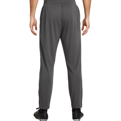 UA Challenger training pants detail — zippered pockets and stretch fabric